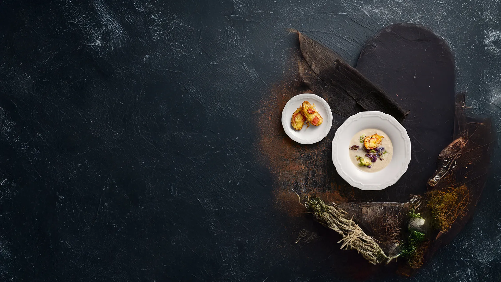 Image of an Artis Crockery Collection on a rustic background