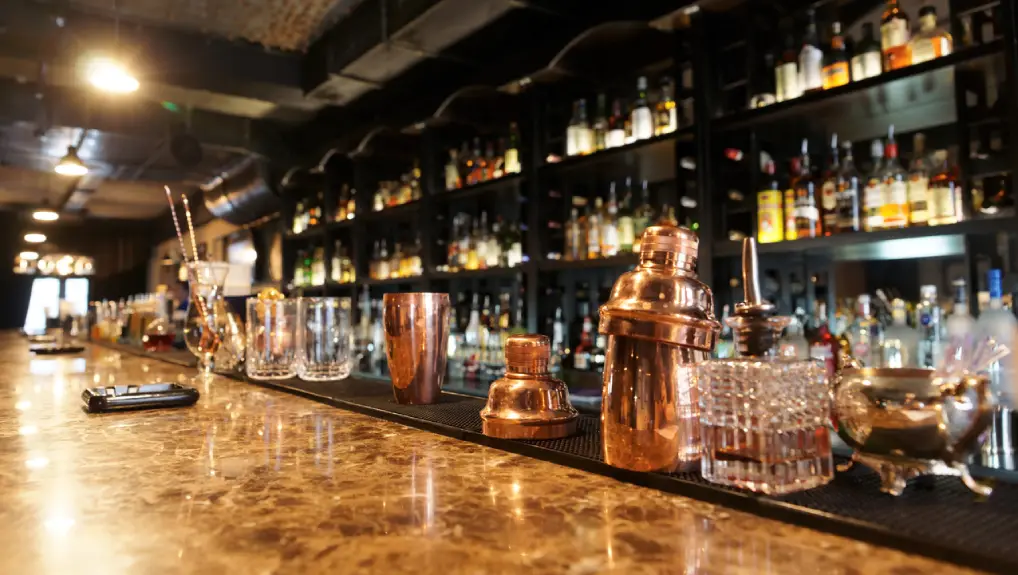 Image of a bar setup idea tools and equipment on a well stocked bar.