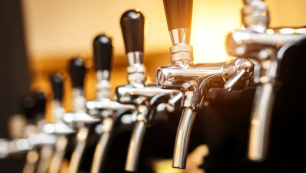 close up image a bar taps for dispensing draught beers