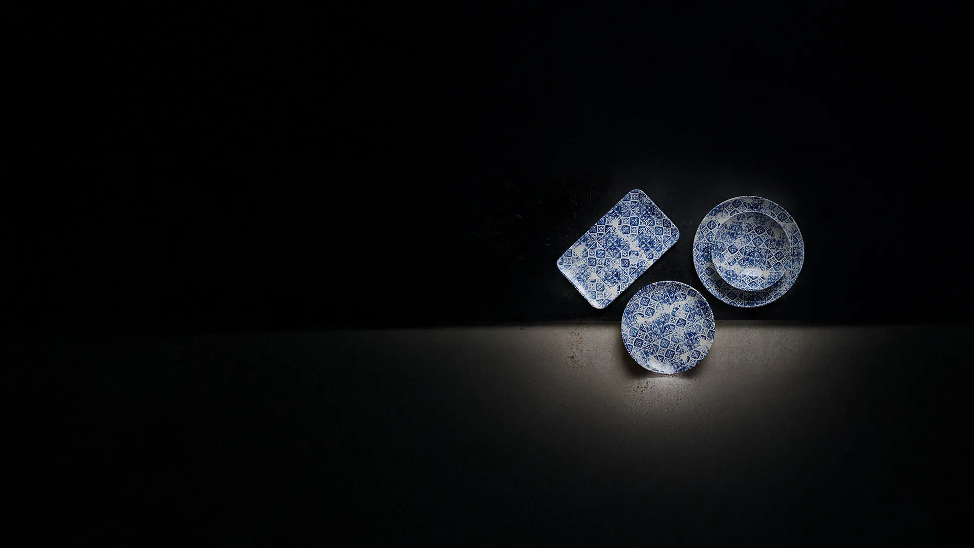 Image of a Dudson crockery collection on a dark background