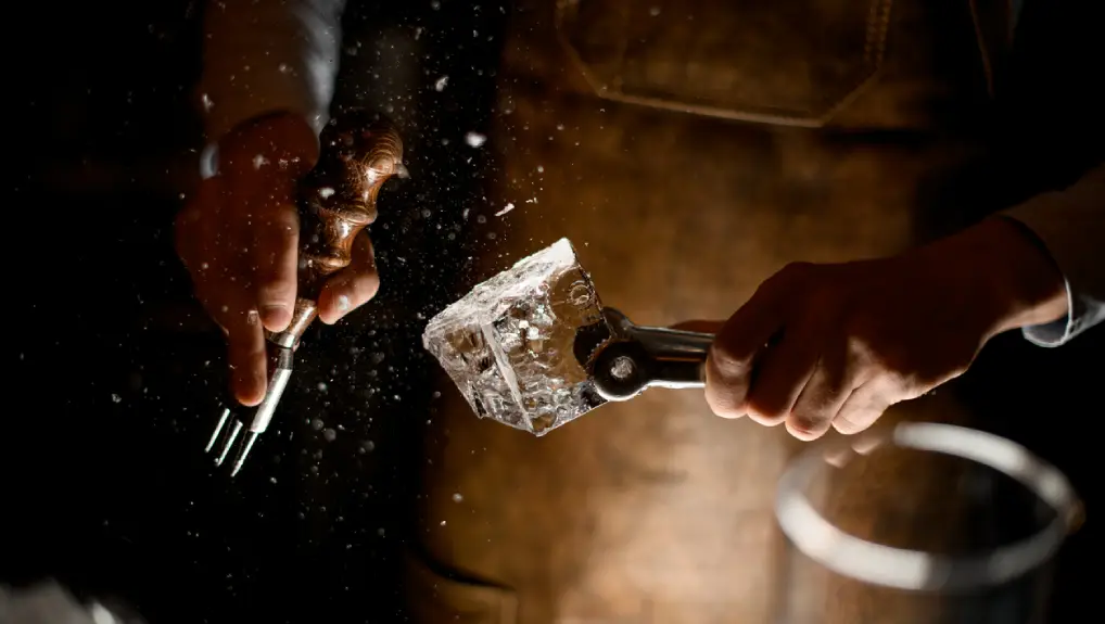 close up image of bartender choosing the right ice tools for the bar