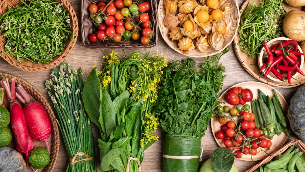 Close up image of local and seasonal ingredients part of the plan for an eco-friendly bar tool set up