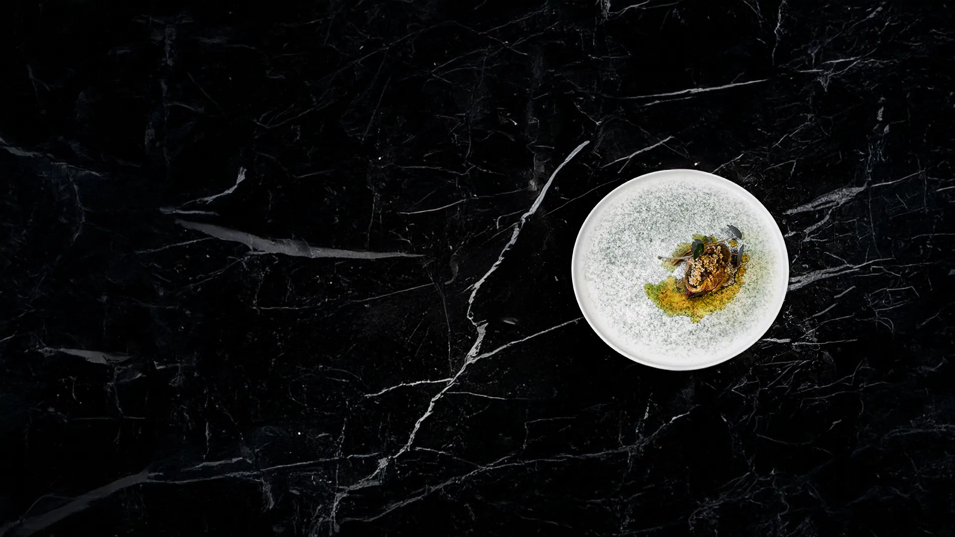 Image of a Plate from Nevilles on a black marble background