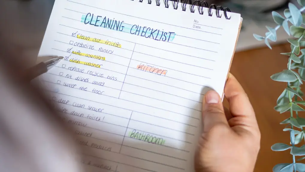 close up over the shoulder image of a cleaning checklist