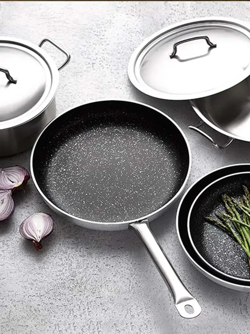 Image of kitchen accessories: a selection of pans