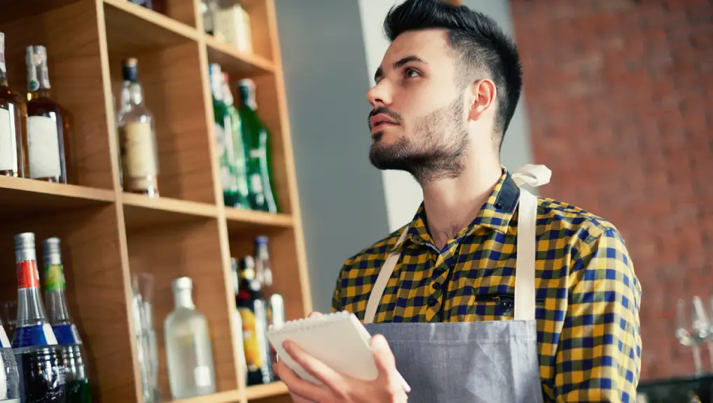 Image of guys in a bar implementing an inventory management and POS system